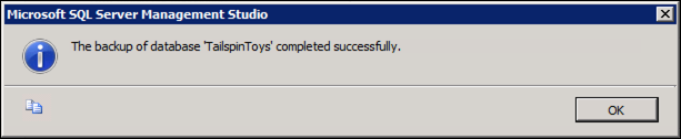 Dialog displayed a message that the database backup was completed successfully.