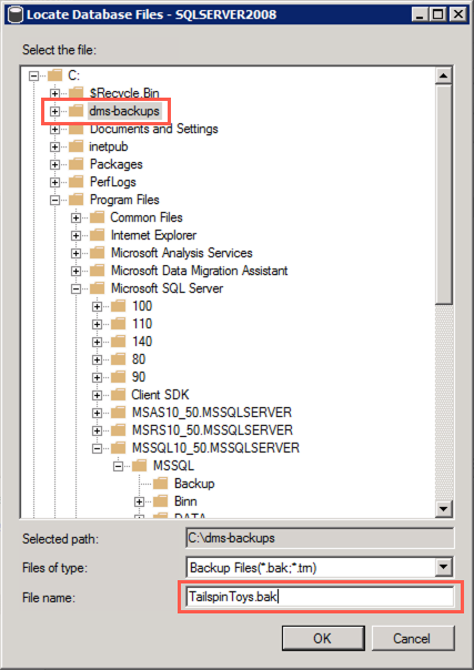 In the Select the file pane, the C:\dms-backups folder is selected and highlighted and TailspinToys.bak is entered into the File name field.